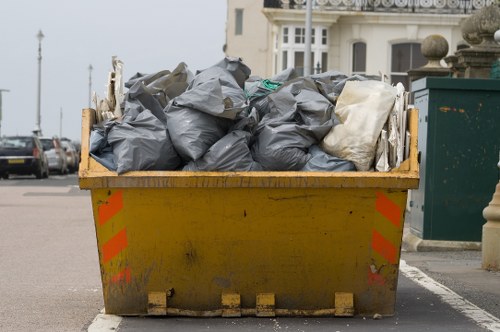 People recycling old furniture in Harrow