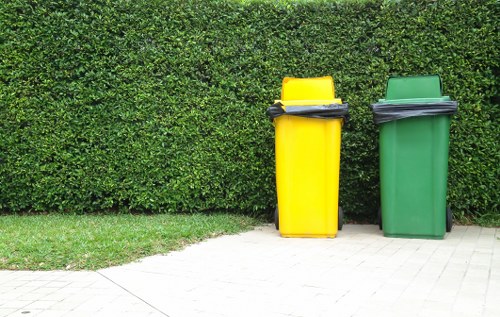 Waste clearance trucks unloading construction debris