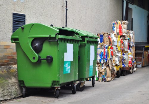 Commercial waste harrow operating in an industrial setting