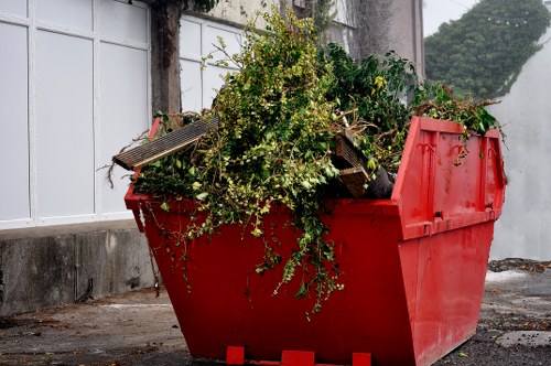 Garden debris being removed by a clearance team in Harrow